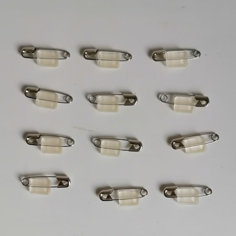 Safety pin with double-sided tape