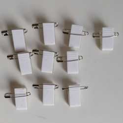 Spilla e clips con biadesivo